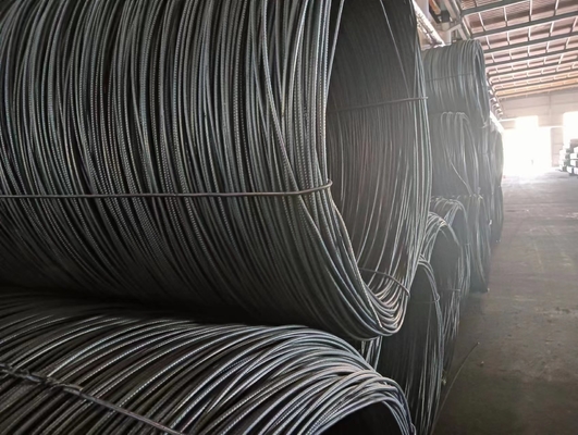 Hot-rolled HRB400 deformed steel rebar, factory-manufactured, available in 12mm and 16mm sizes for construction reinforcement.